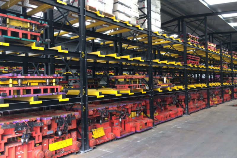 Heavy-duty-racking-fork-entry-bars tools stored on fork entry bars of heavy duty racking