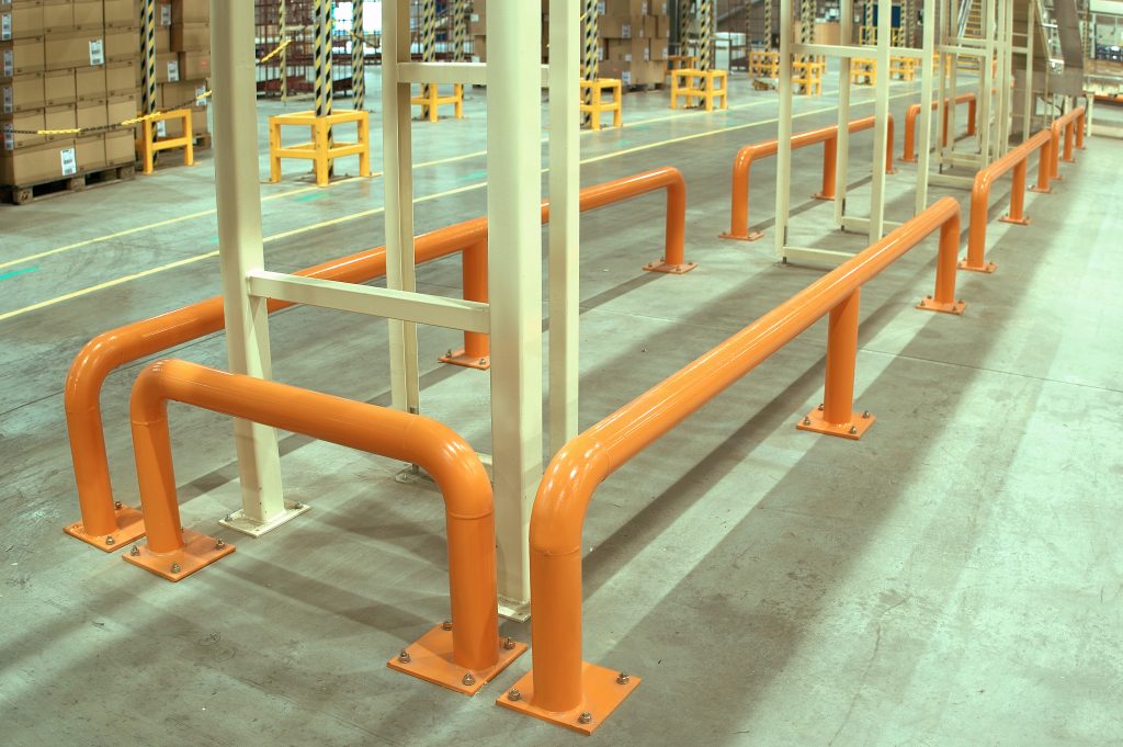 tubular steel barriers installed around metail posts