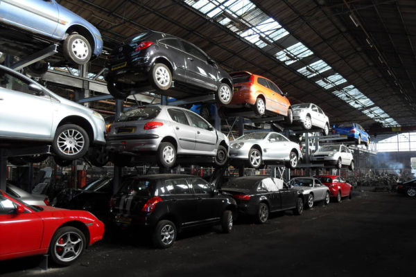 car-storage-racking Indoors cantilever racking with vehicles stored on three levels