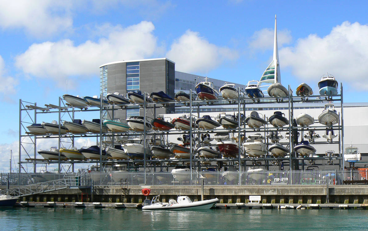 dry-stack-storage-for-boats four tier dry stack boat rack full of boats.