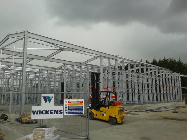 Construction of a rack clad building