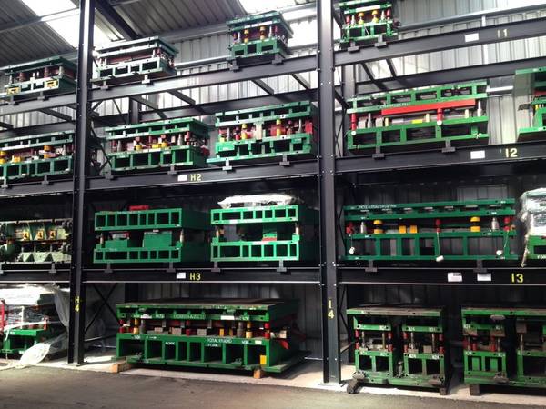 tools stored on heavy duty racking in a rack clad building