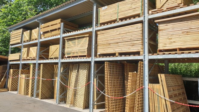 Heavy Duty Rack with a roof canopy storing timber fence panels